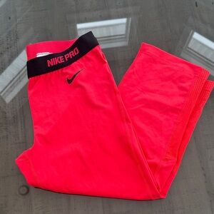 Nike Pro Dri Fit Hot Pink Leggings Womens size XL. Inseam: 20 in. Mesh details